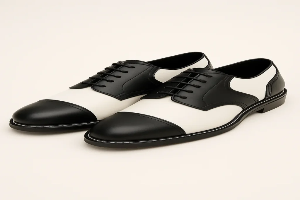 Elegant black and white men’s shoes blending classic and modern style